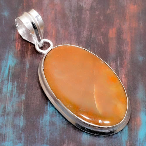 Ember’s Embrace – Silver Orange Agate Pendant