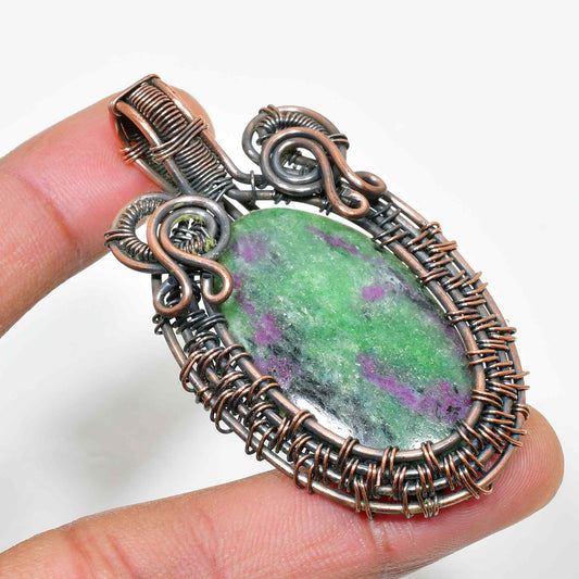Compassion’s Embrace – Rhodonite Copper Pendant