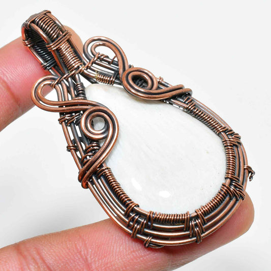 Raven’s Embrace – Copper-Wrapped Crystal Pendant