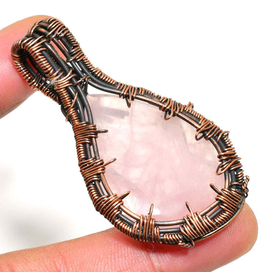 Lucia’s Embrace – Rose Quartz Copper Pendant