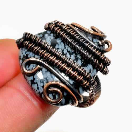 Dusk’s Embrace – Snowflake Obsidian Copper Pendant