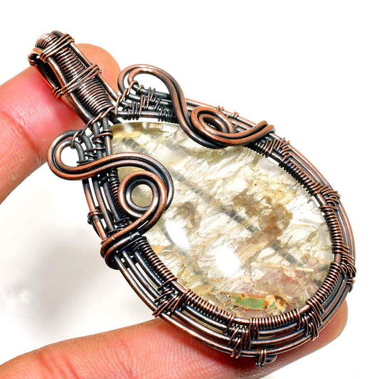 Ezra’s Veil – Copper-Wrapped Quartz Pendant