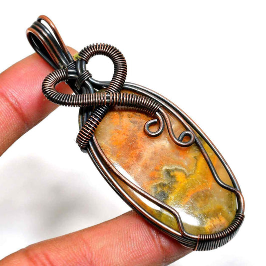 Ember’s Embrace – Grounding Earthstone Copper Pendant