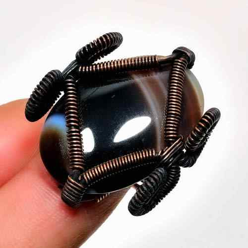 Raven’s Aegis – Obsidian Copper Ring