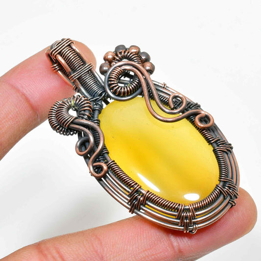 Solar Serenade – Yellow Agate Copper Pendant