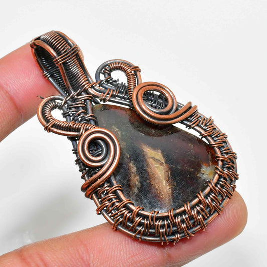 Earthbound Embrace – Oxidized Copper Agate Pendant