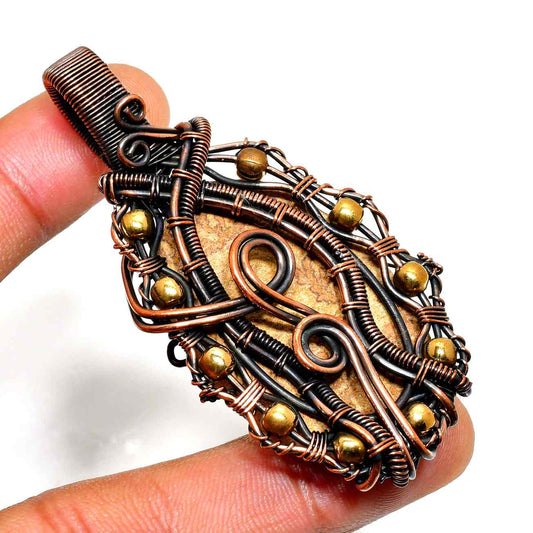 Artisan’s Embrace – Earthstone Copper Pendant
