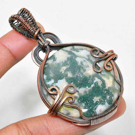 Ember’s Embrace – Copper-Wrapped Green Stone Pendant