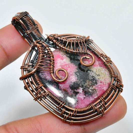 Heart’s Embrace – Rhodonite & Oxidized Copper Pendant
