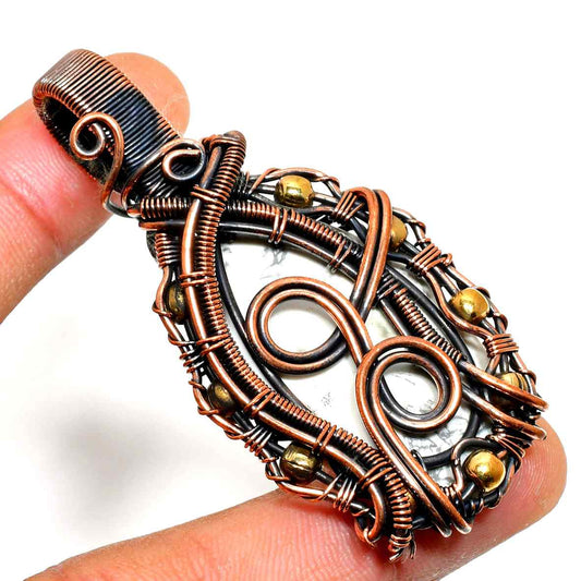 Celestial Embrace – Clear Quartz Copper Pendant