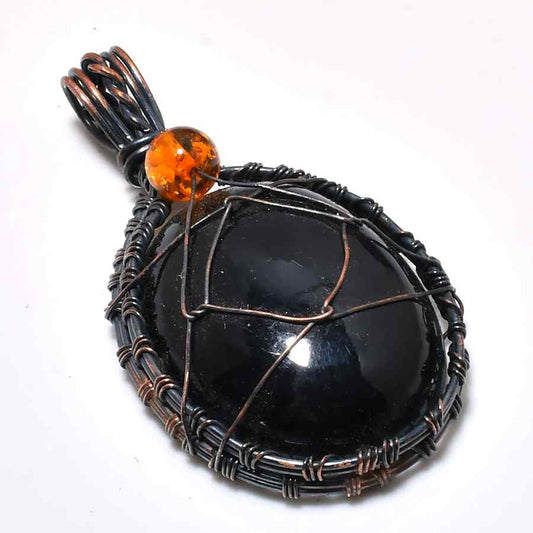 Ember Ground – Black Onyx & Amber Copper Pendant