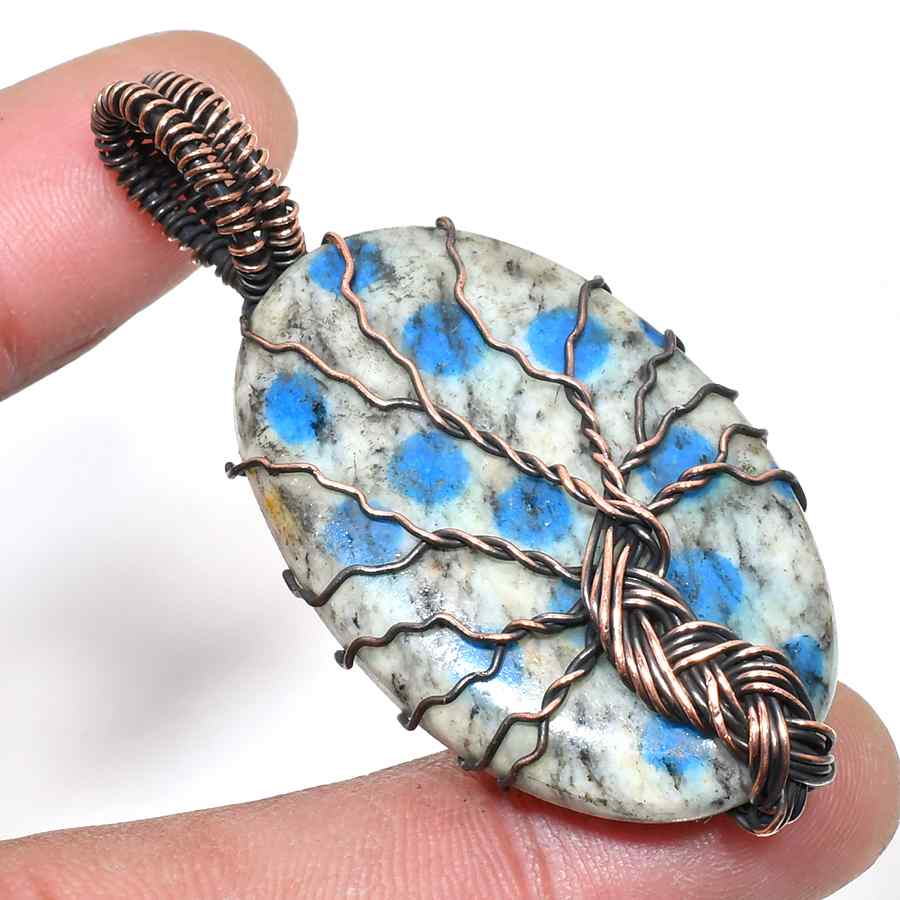Nature’s Embrace – Copper-Wrapped Gemstone Pendant