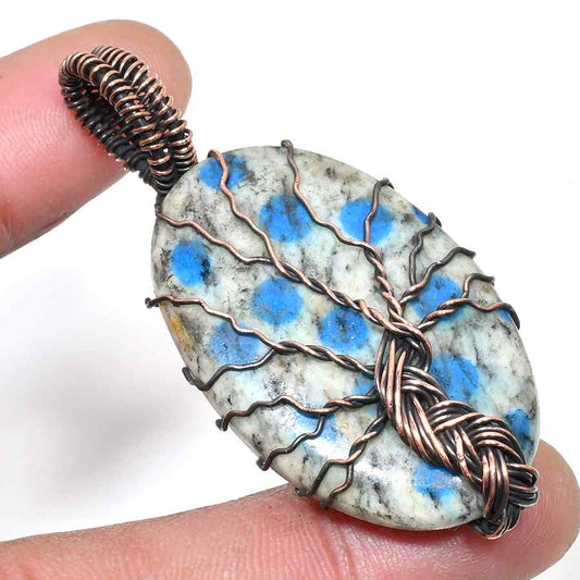 Nature’s Embrace – Copper-Wrapped Gemstone Pendant