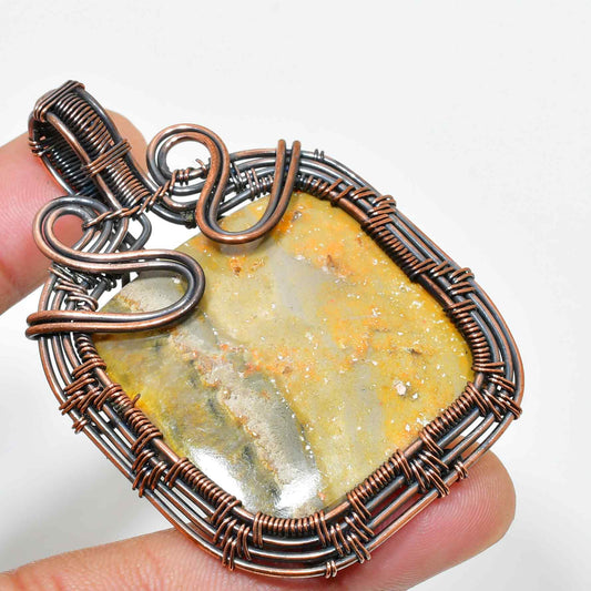 Earth’s Embrace – Copper-Wrapped Gemstone Pendant