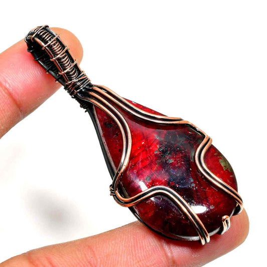Ember’s Embrace – Garnet Copper Pendant