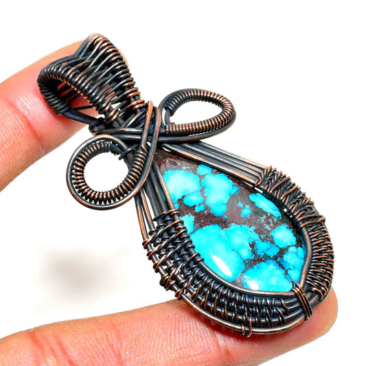 Azure’s Embrace – Turquoise Copper Pendant