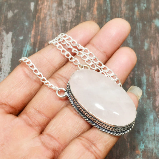 Serenity’s Embrace – Rose Quartz Sterling Silver Pendant