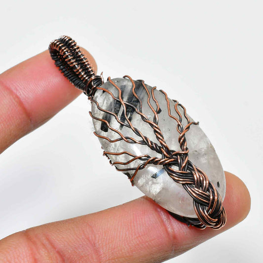Gaia’s Radiance – Clear Quartz Tree of Life Pendant