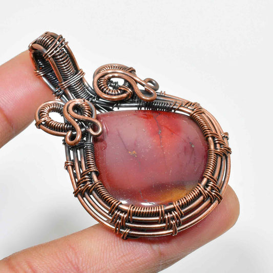 Ember’s Spark – Carnelian Copper Pendant