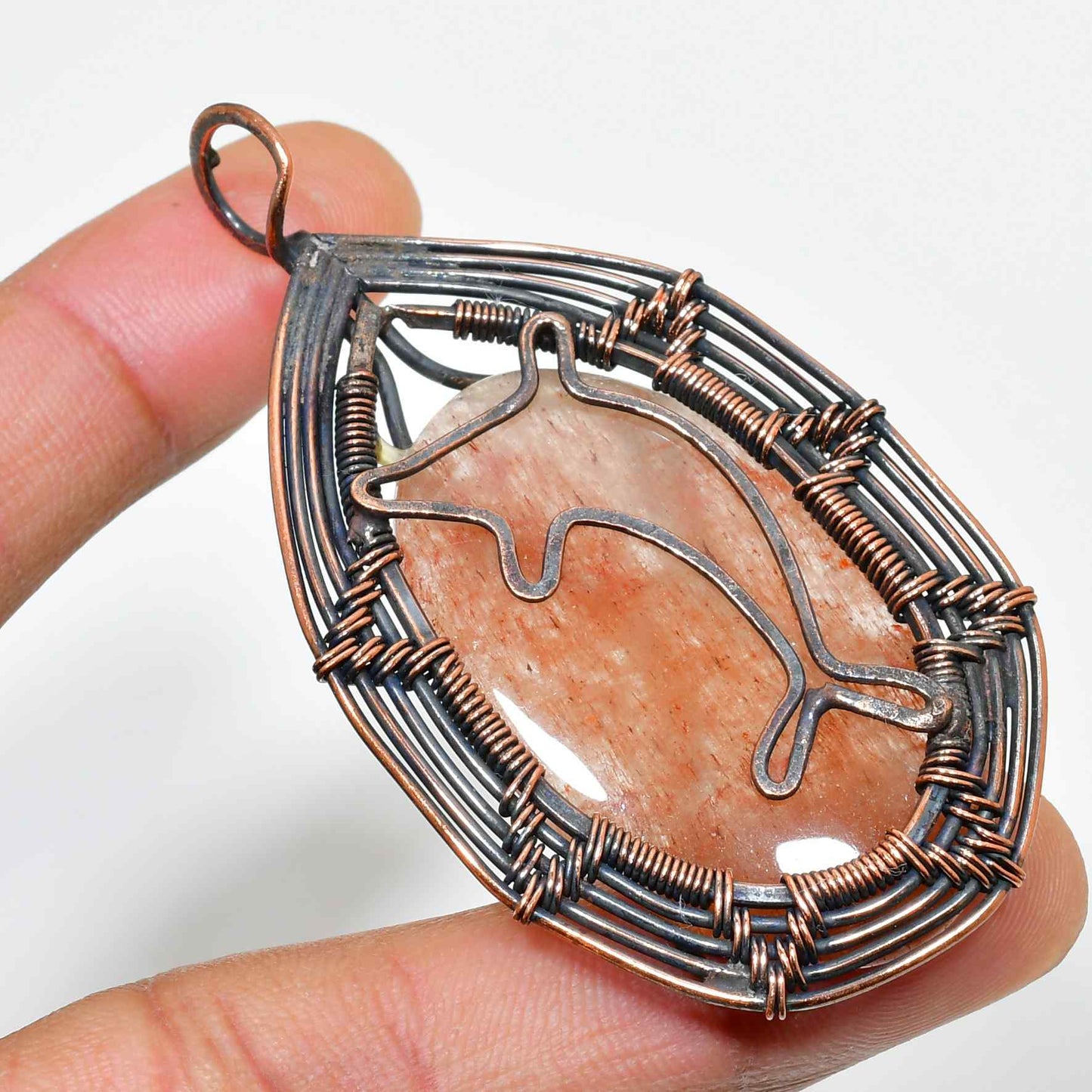Sunlit Dolphin – Oxidized Copper Sunstone Pendant