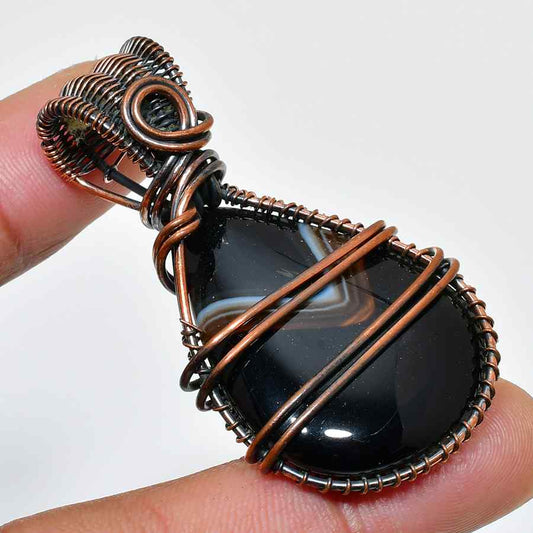 Earth’s Embrace – Black Agate Copper Pendant