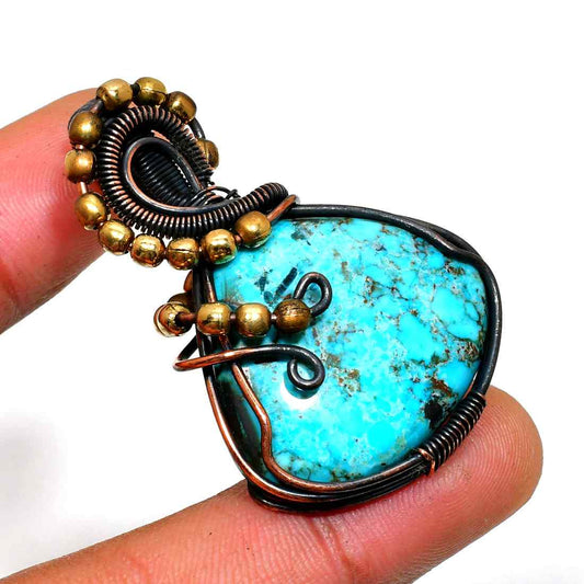 Tranquil Talisman – Handcrafted Turquoise Copper Pendant