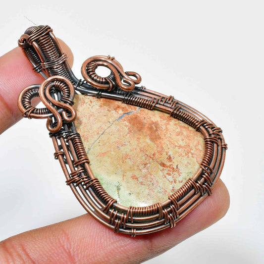 Terra’s Embrace – Oxidized Copper Stone Pendant