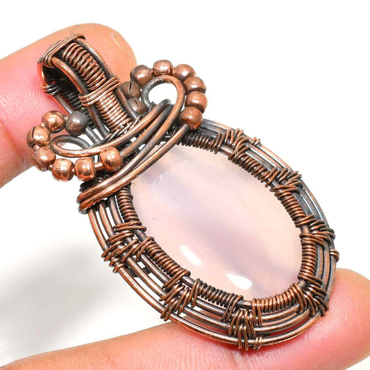 Aurora’s Embrace – Rose Quartz Copper Pendant