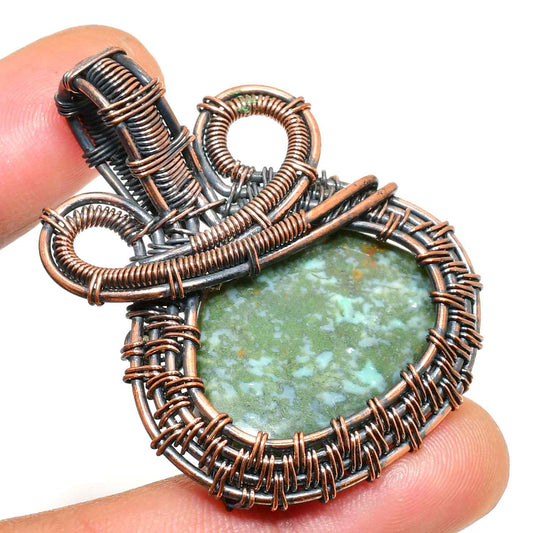 Gaia’s Embrace – Green Stone Copper Pendant