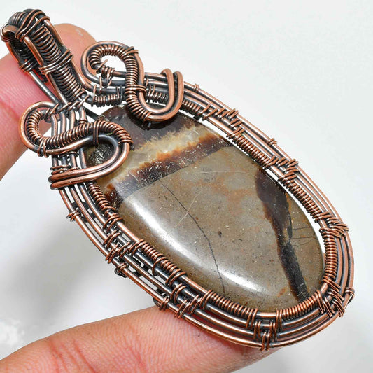 Gaia’s Embrace – Earthstone Copper Pendant