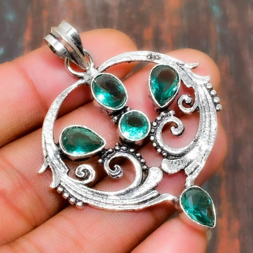 Tranquility’s Embrace – Teal Gemstone Filigree Pendant