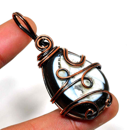 Gaia’s Embrace – Oxidized Copper & Natural Stone Pendant