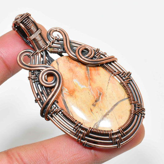 Ember’s Glow – Orange Jasper Copper Pendant