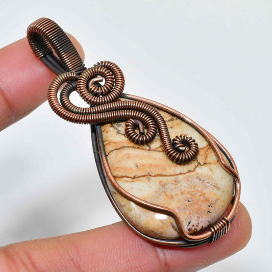 Terra’s Embrace – Oxidized Copper Wrapped Stone Pendant