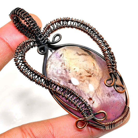 Ezra’s Veil – Handwrapped Amethyst & Copper Pendant