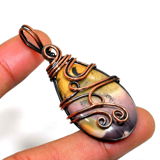 Serenity’s Embrace – Copper-Wrapped Natural Stone Pendant