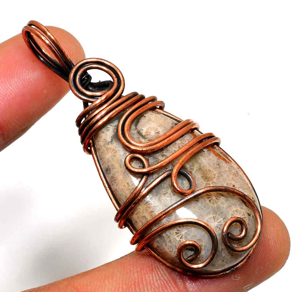 Gaia’s Embrace – Fossil & Copper Pendant