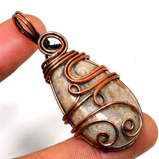Gaia’s Embrace – Fossil & Copper Pendant