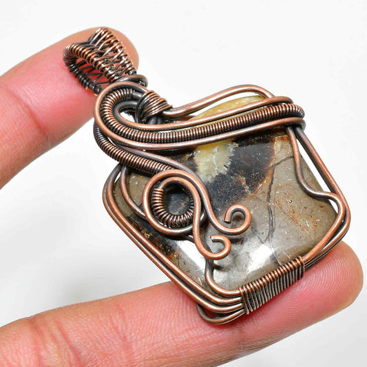 Gaia’s Embrace – Earthstone Copper Pendant