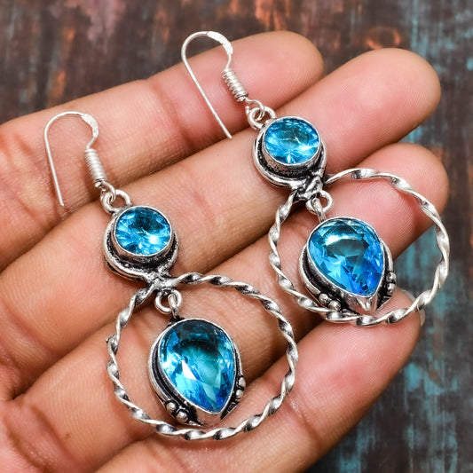 Ocean’s Whisper – Blue Topaz Statement Earrings