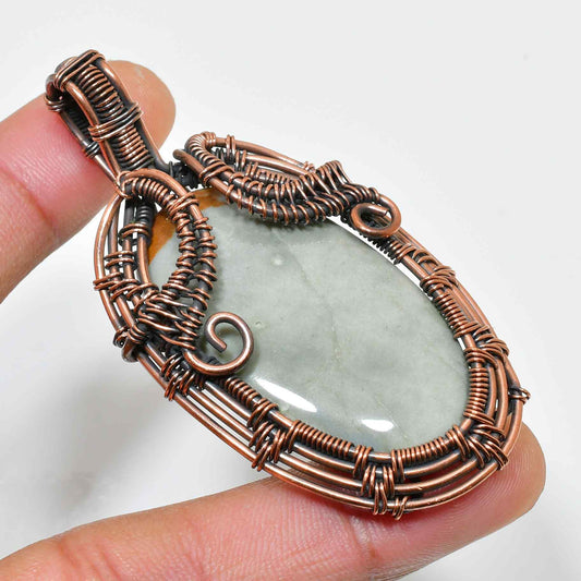 Serenity’s Embrace – Jade & Copper Pendant
