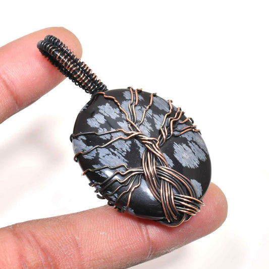 Earth’s Embrace – Black Stone Copper Pendant