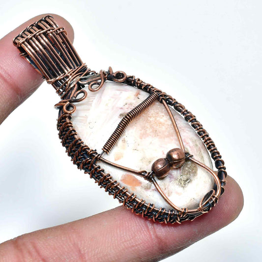Celestial Embrace – Copper-Wrapped Crystal Pendant