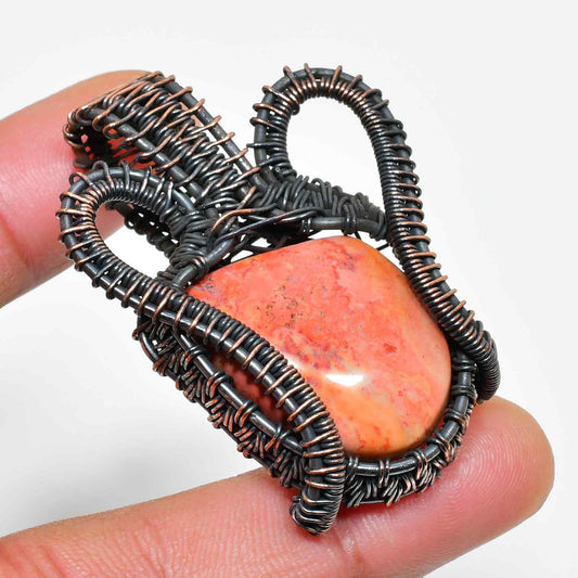 Marisol’s Embrace – Coral Copper Pendant