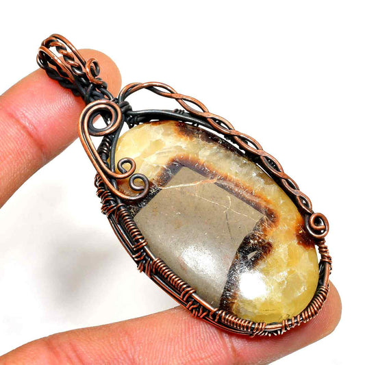 Tranquility’s Heart – Copper-Wrapped Gemstone Pendant