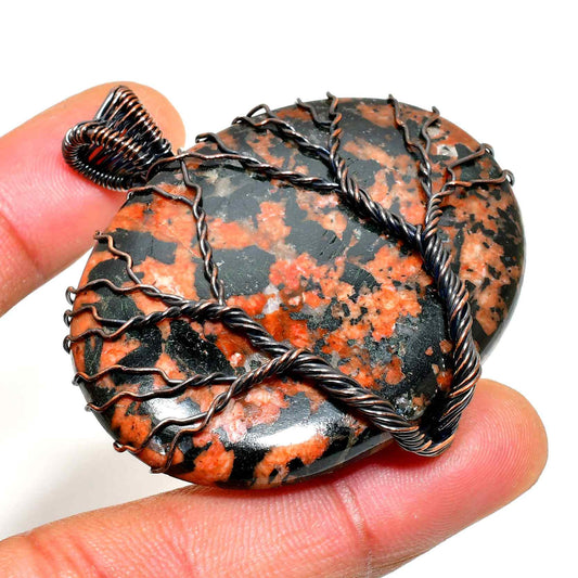 Ember’s Embrace – Black & Red Wire-Wrapped Pendant