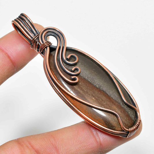 Terra’s Embrace – Brown Jasper Copper Pendant