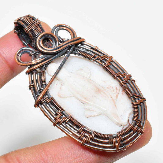 Whispering Waves – Dolphin Copper Pendant