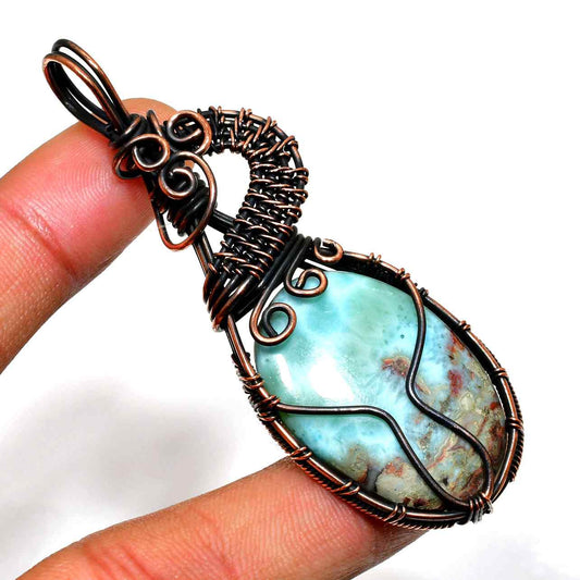 Ocean’s Whisper – Copper-Wrapped Larimar Pendant