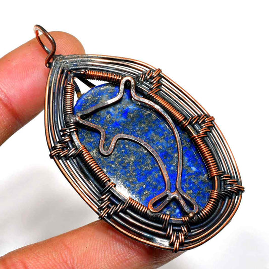 Dolphin’s Embrace – Lapis Lazuli Copper Pendant